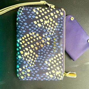 Wristlet with 6 credit slots , a snap in for phone battery or mirror or cash